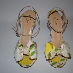 Satin off-white, yellow and green tone sandals.